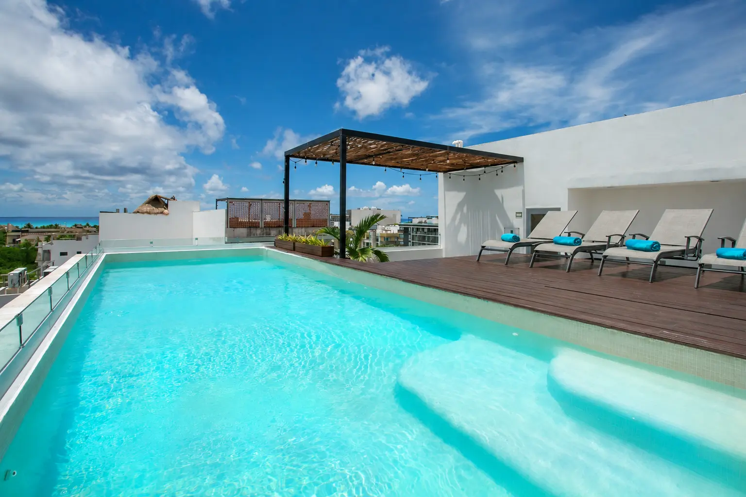 Rooftop pool with Caribbean view